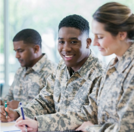 Government service personnel reviewing documents during public service interaction as Confero offers customer experience research options for these industries.