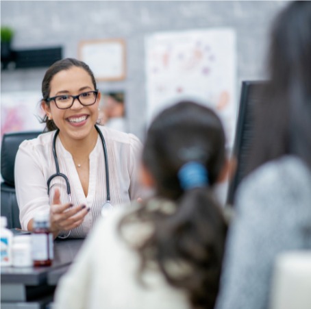 Doctor speaking with patients is an illustration of the customer experience research options that Confero offers in medical and legal industries.
