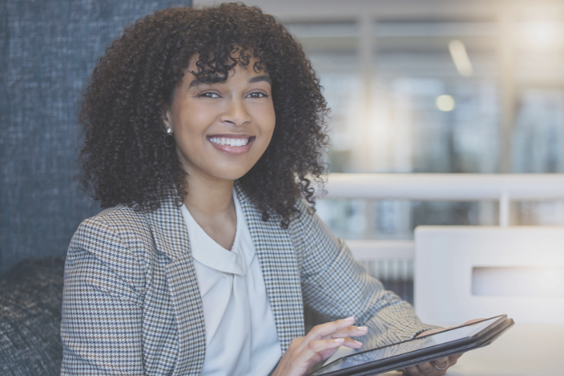 Financial professional greeting a client as an illustration of Confero's financial customer experience research industry.